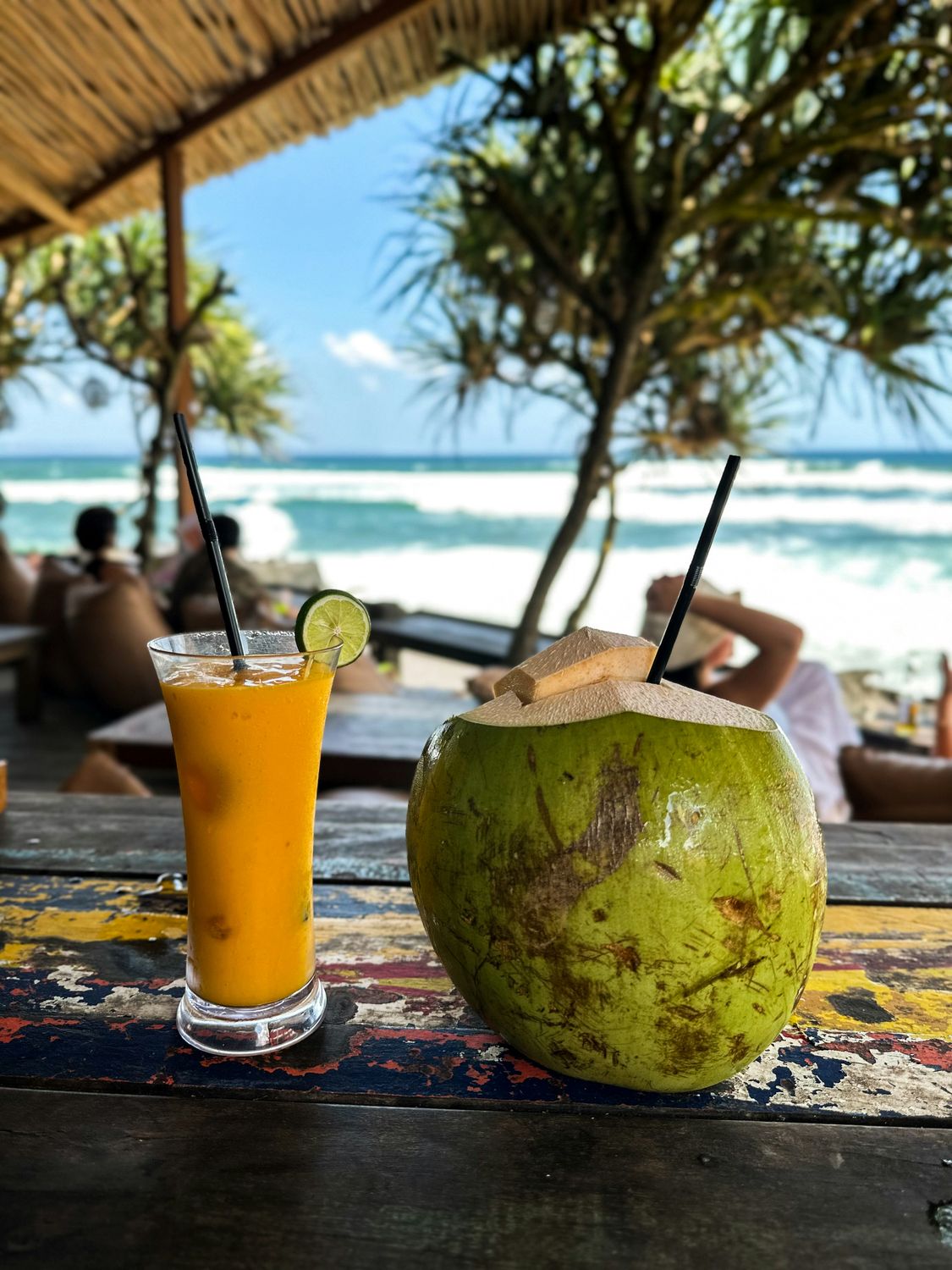 A fresh coconut at a Bali beach bar